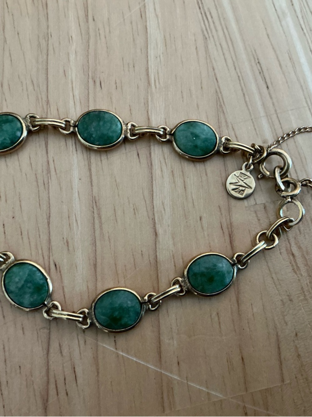 Gold-Tone Bracelet with Green Oval Stone Accents